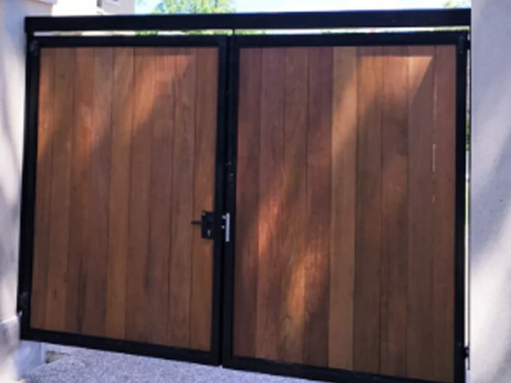 Wood vs metal gates San Antonio home entry with custom wood and metal gate options
