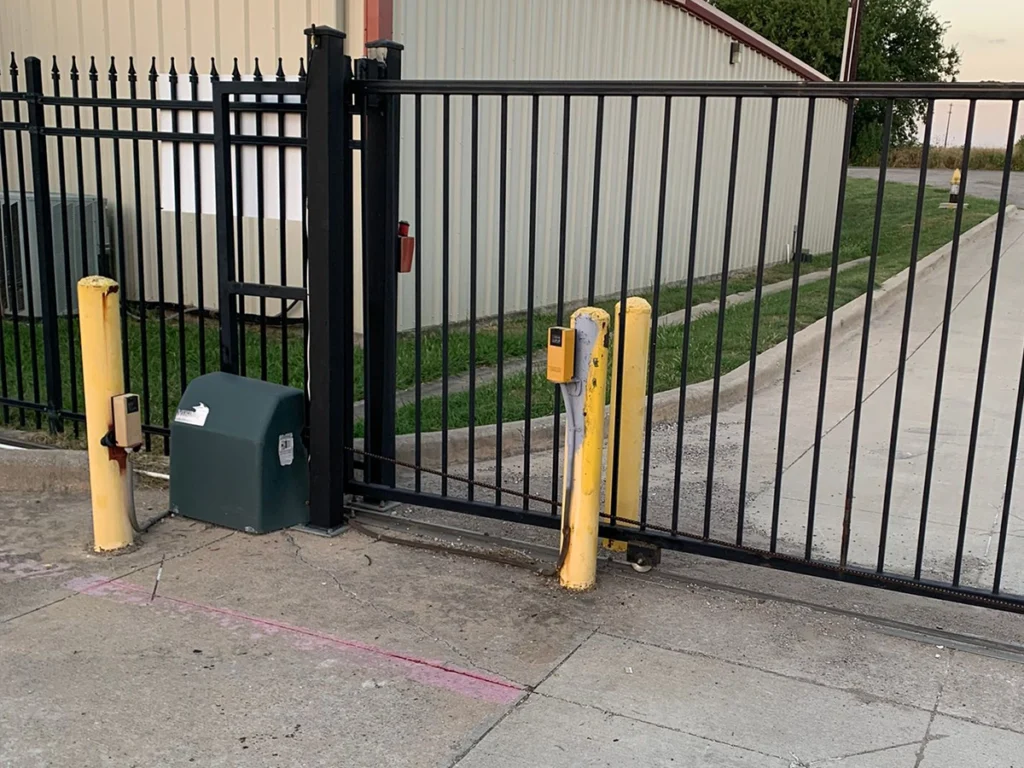Automated commercial gate securing a business entrance in Frisco, TX