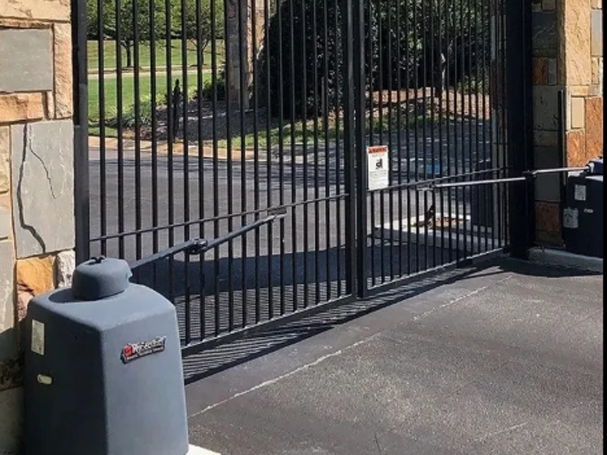 Electric Gate Installation in a new Frisco community with a modern gated entrance